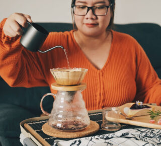 woman making pour over coffee